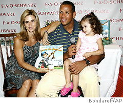 Make room for one more - Alex Rodriguez and his wife, Cynthia, smile with their daughter, Natasha, at a July signing of 'Out of the Ballpark,' the children's book A-Rod dedicated to his 2-year-old. Photo credit Bondareff/AP