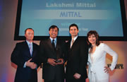 Lakshmi Mittal receives the 2005 award for entrepreneur of the year from Todd Thompson, flanked by CNBC presenters Simon Hobbs and Maria Bartiromo